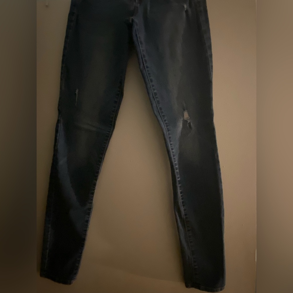 Medium washed Blue Jeans w/ small rips